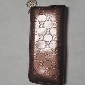 Gucci heart charm zip around wallet